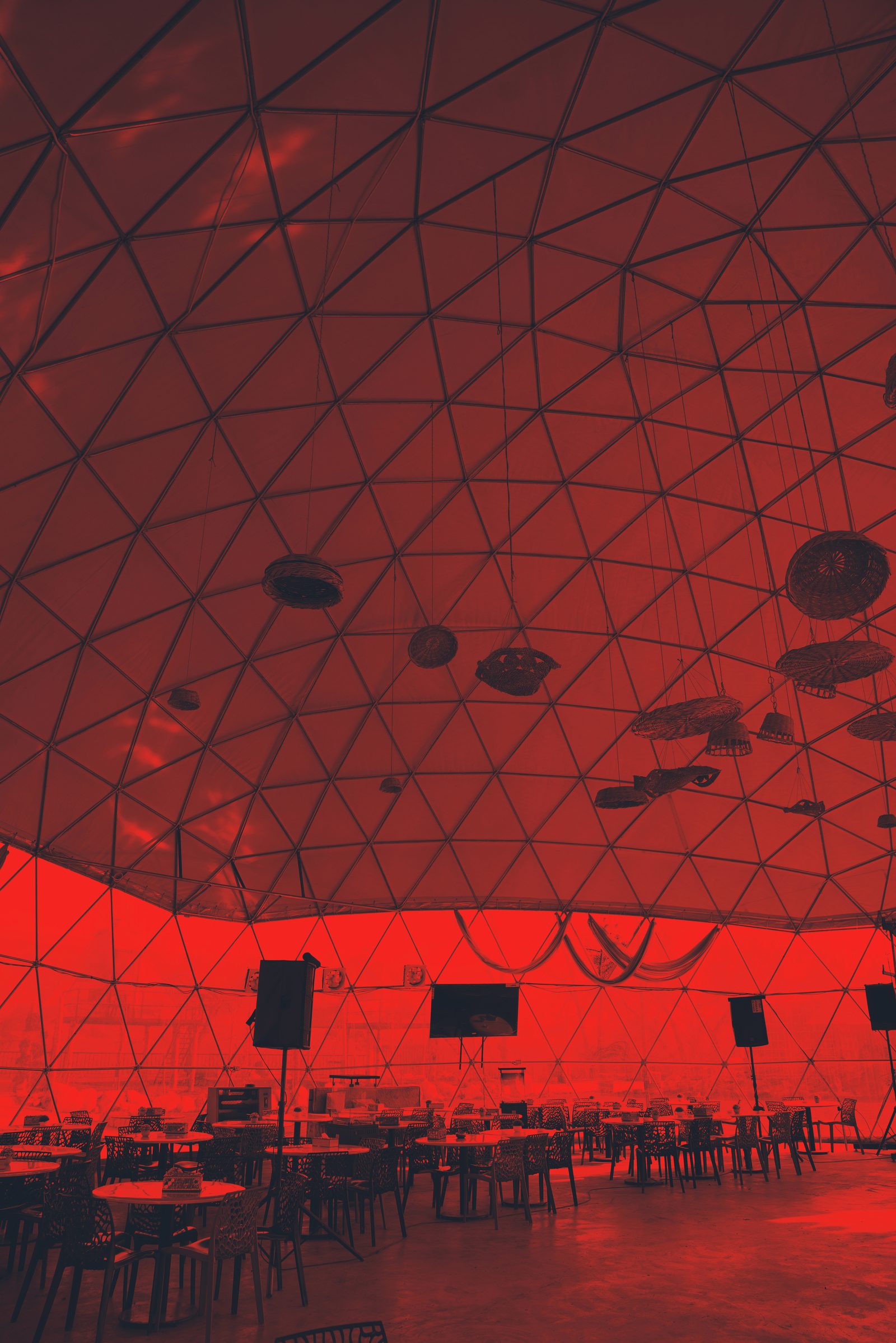 Dome interior lit in red with projection